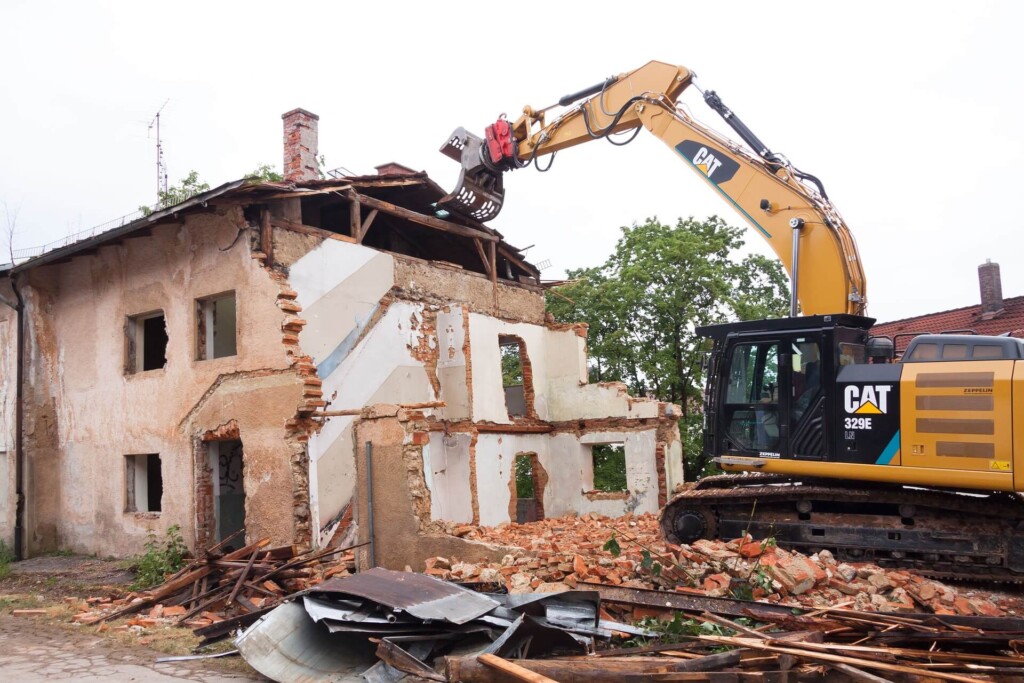 building being demolished by our demolition services in hill county tx