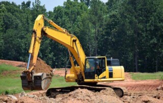 How to Maintain a Backhoe